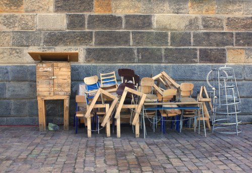 Residents placing furniture for disposal in Rickmansworth